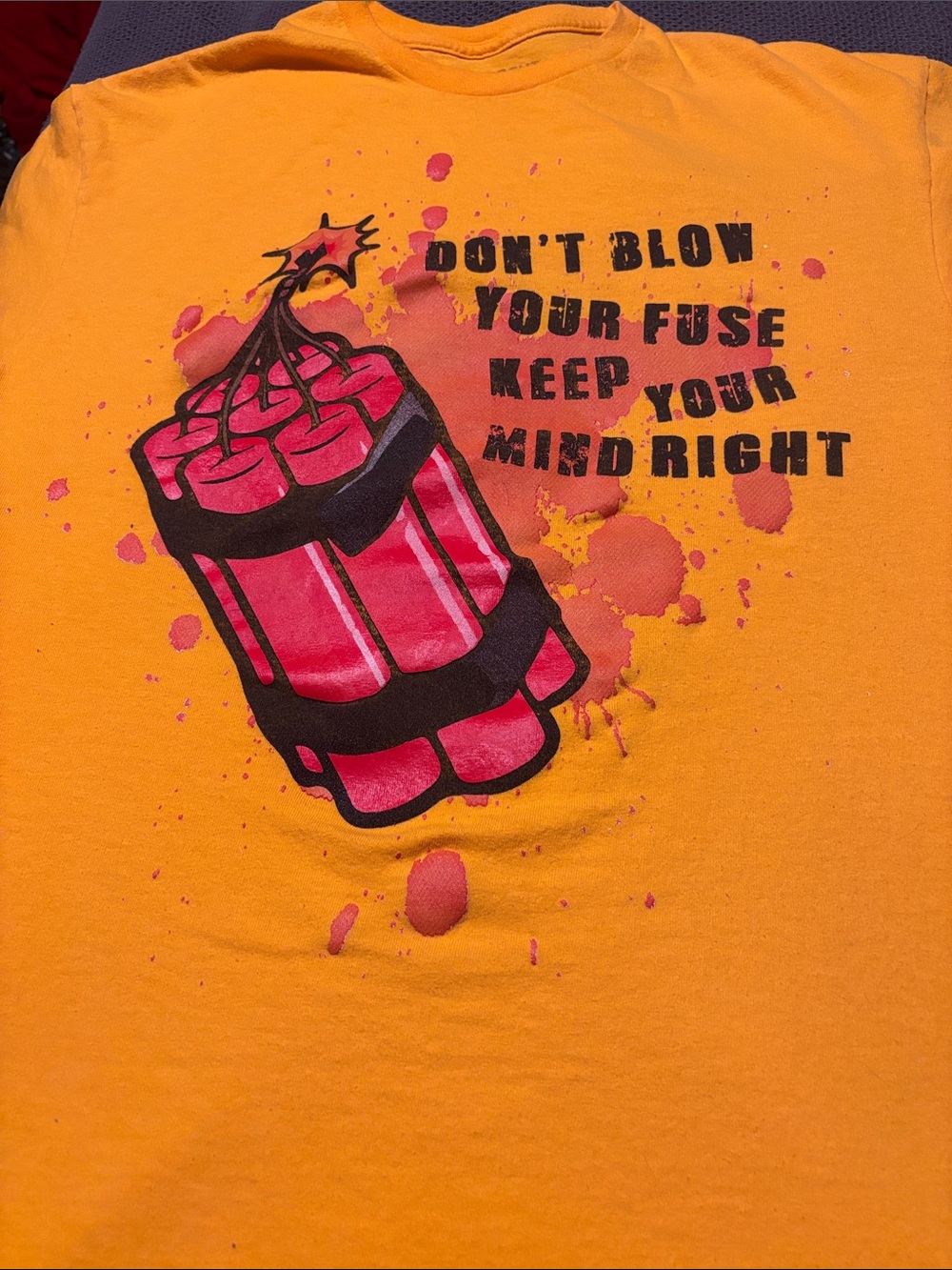 Men's Orange Short-Sleeve Graphic Tee with Red Dynamite Print